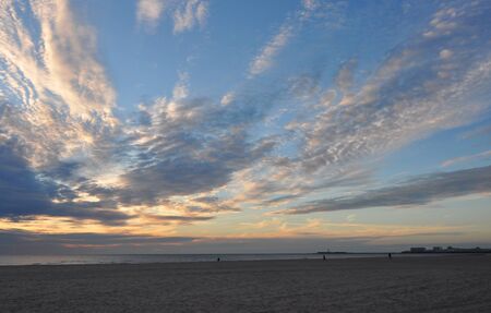 beautiful and colorful sunset on cadiz beach in southern spainの写真素材