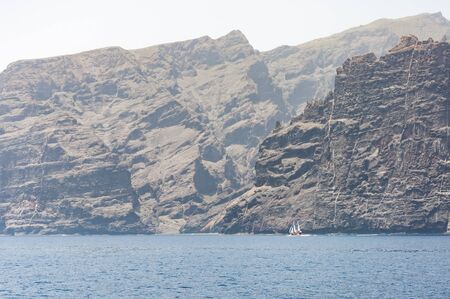 beautiful seascape with rocky cliffs in tenerife in spainの写真素材
