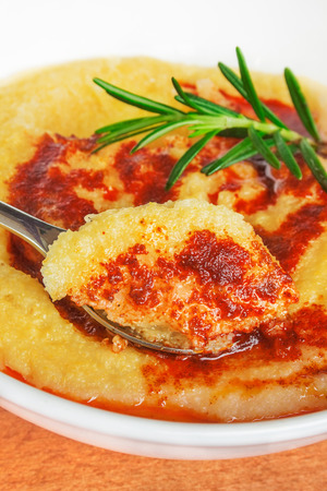 Polenta with butter and red pepperの写真素材