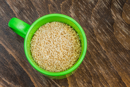 Healthy wholegrain couscous in a cup.の写真素材