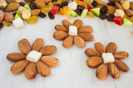 Raw nuts and dried fruits in beautiful arrangement.の写真素材