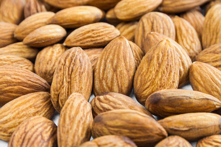 Raw almond nuts close up.の写真素材