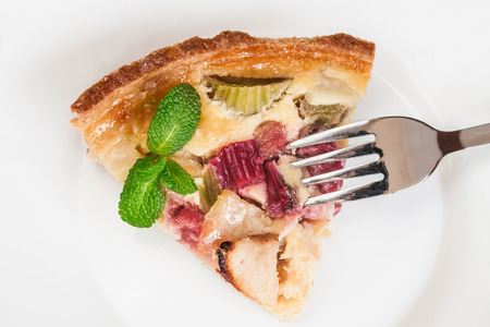 French tart with apples and rhubarb close up.の写真素材