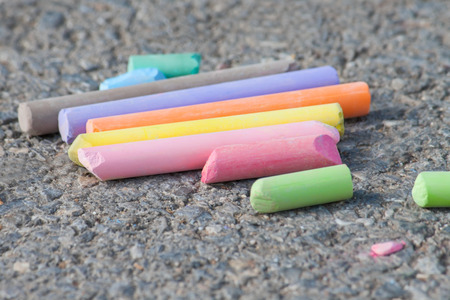 Colorful chalks on the asphalt.の写真素材