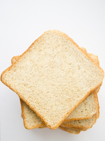 Top view of bread on white background