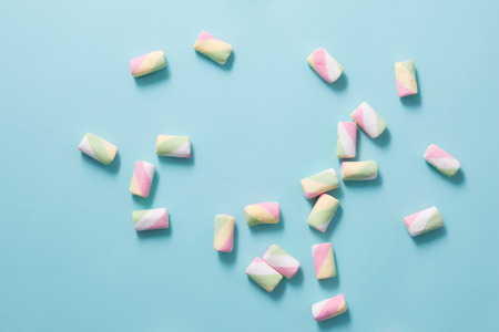 Marshmallow on blue backgroundの写真素材