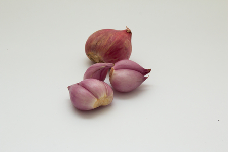 Peeled onion on white background.の写真素材