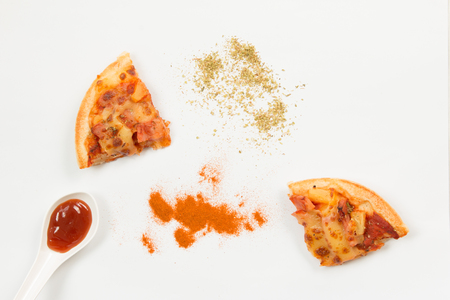 Top view of Hawaiian Pizza with topping on white tablecloth.の写真素材