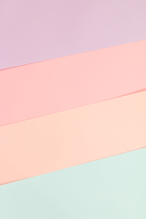 Colorful pastel paper stacks background.の写真素材