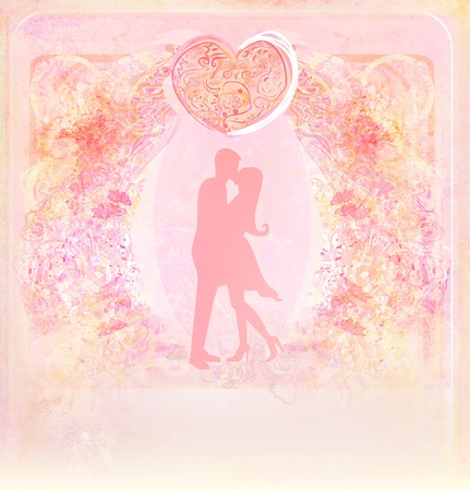 Floral greeting card with silhouette of romantic couple の写真素材