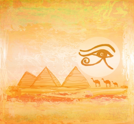 Egypt symbols and Pyramids - Traditional Horus Eye symbol and camel silhouette in front の写真素材