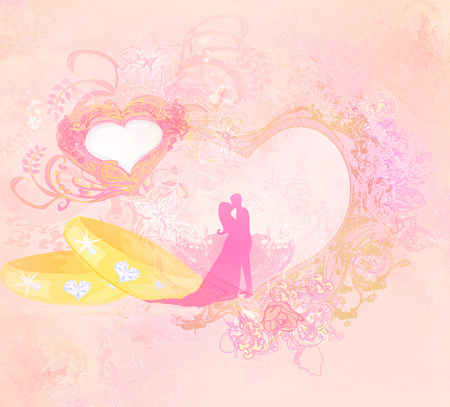 golden wedding rings and wedding couple - Invitation card の写真素材