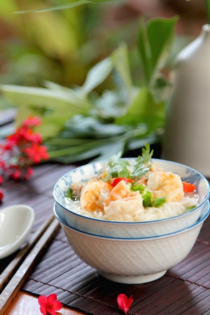 Rice soup with prawn and mince pork の写真素材