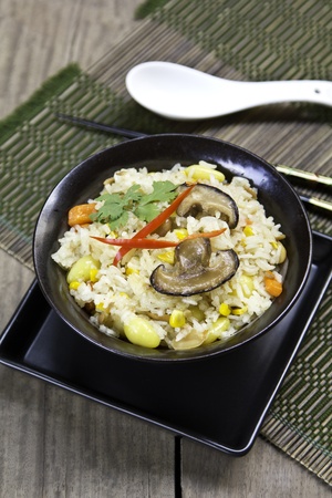 Fried rice with mushroom,sweet corn and carrotの写真素材