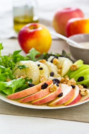 Apple ,Grapefruit and walnut saladの写真素材