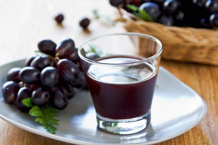 Fresh Grape juice by some Grape vinesの写真素材