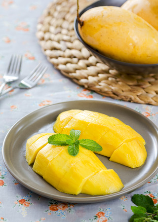 Fresh ripe Thai mango in a dishの写真素材