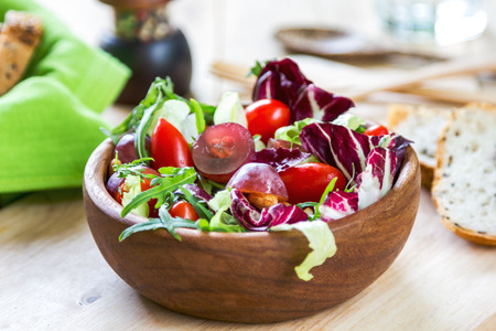 Grape with Radicchio, Rocket salad by some sesame breadの写真素材