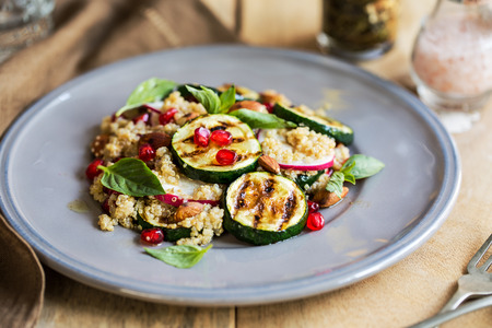 Quinoa with grilled courgette, almond and omegranate saladの写真素材