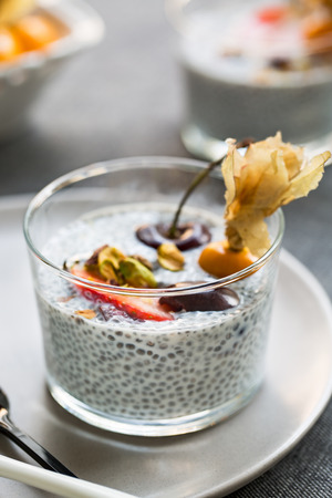 Chia pudding with Strawberry,Cherry Gooseberry and Pistachioの写真素材