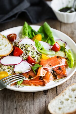 Smoked Salmo, Alfafa Sprout ,Cherry Tomato Salad with Basil oilの写真素材