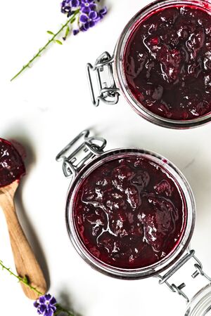 Homemade Roselle Jam with Cinnamon in Preserve Jarsの写真素材