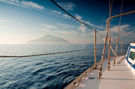 Sailing on yacht on beautiful clear seaの写真素材