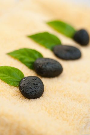 Zen-like stones with water dropsの写真素材