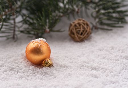 Christmas decoration covered with snowの写真素材