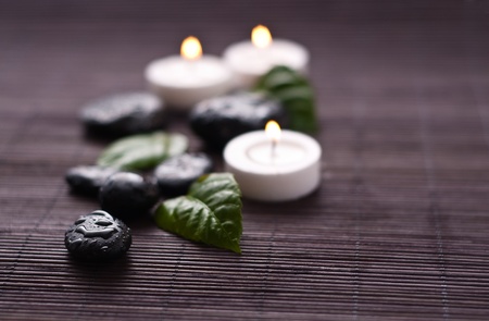 Zen-like spa detail with black stonesの写真素材
