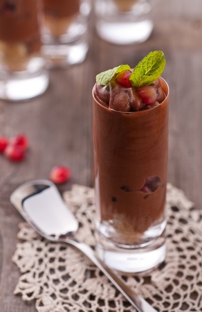 Chocolate mousse with pomegranate and mintの写真素材