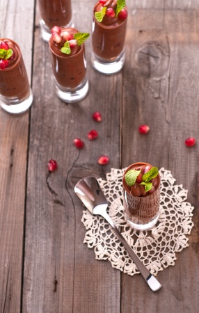 Chocolate mousse with pomegranate and mintの写真素材
