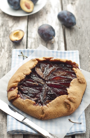 Fresh homemade plum galette over the tableの写真素材