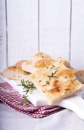 Rosemary Focaccia cut into piecesの写真素材