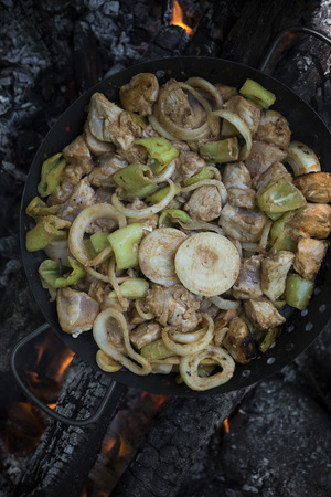 Char grilled chciken bites with vegetablesの写真素材