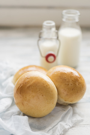 Milk rolls on white tableの写真素材