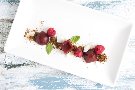 Raspberry jelly with mint and coconut flakesの写真素材