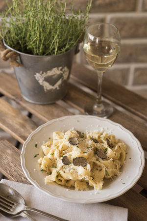 Black truffle and Parmesan homemade pastaの写真素材