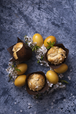 Easter wreath with eggs and sweet bunsの写真素材