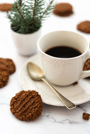 Homemade oat cookies with cup of coffeeの写真素材