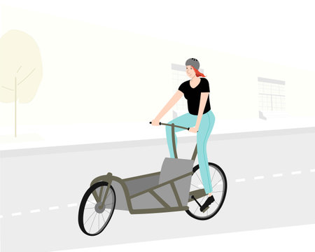 Sportive woman riding empty cargo bicycle on city road. Bakfiets composition.のイラスト素材