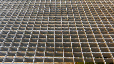 Metal grate floor with rectangular cells, perspective view. Horizontal background.