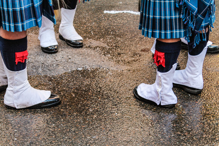 Scottish bagpipe player in Kilts and Spatsの写真素材