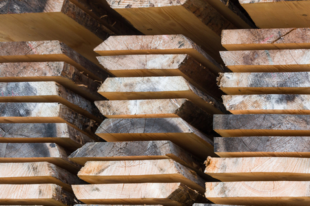 Stacked wooden planksの写真素材