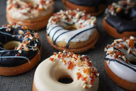 Homemade Gluten Free Donuts with Dark and White Chocolate Glaze Nougat Peanutの写真素材