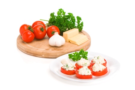 Sliced tomato with cheese sauceの写真素材