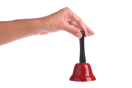 Hand holding bell