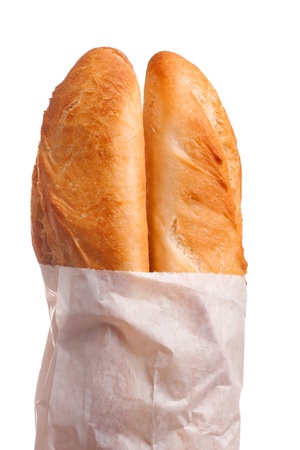 Two french baguettes in paper bagの写真素材