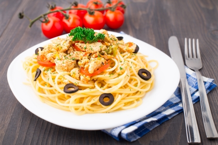 Pasta with chicken brest on a plateの写真素材