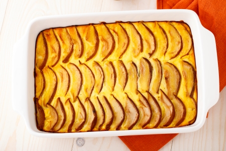 Pie made with fresh pears on a wooden tableの写真素材